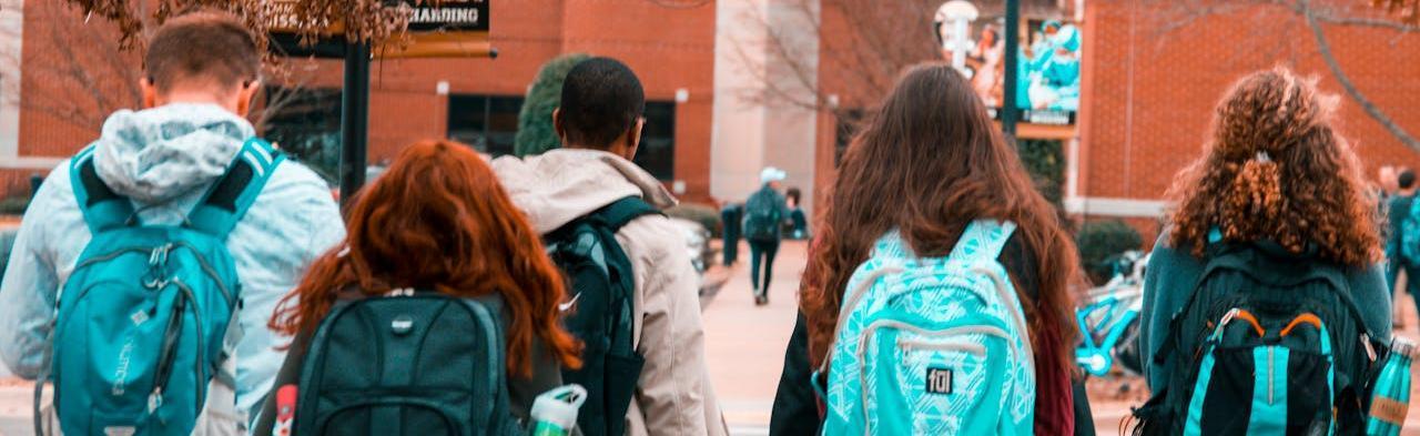 Students with backpacks on campus
